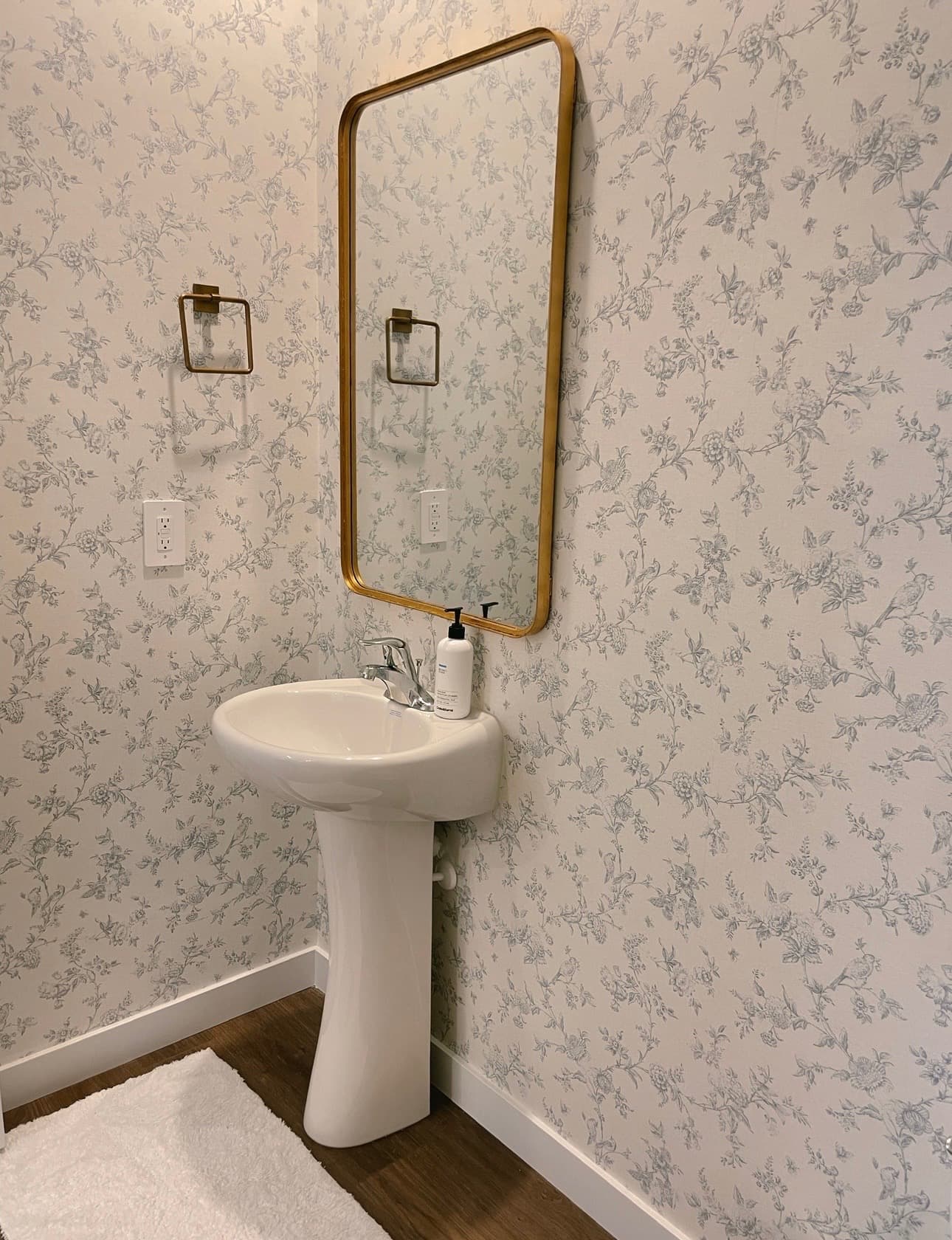 Second powder bathroom after wallpaper installation