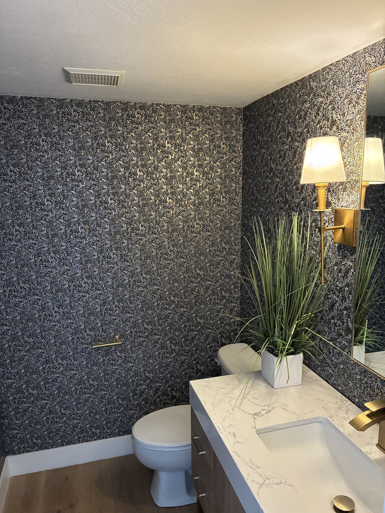 Powder bathroom after wallpaper installation